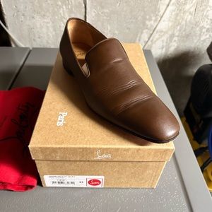 christian louboutin dandelion loafers brown in color worn once for a wedding.